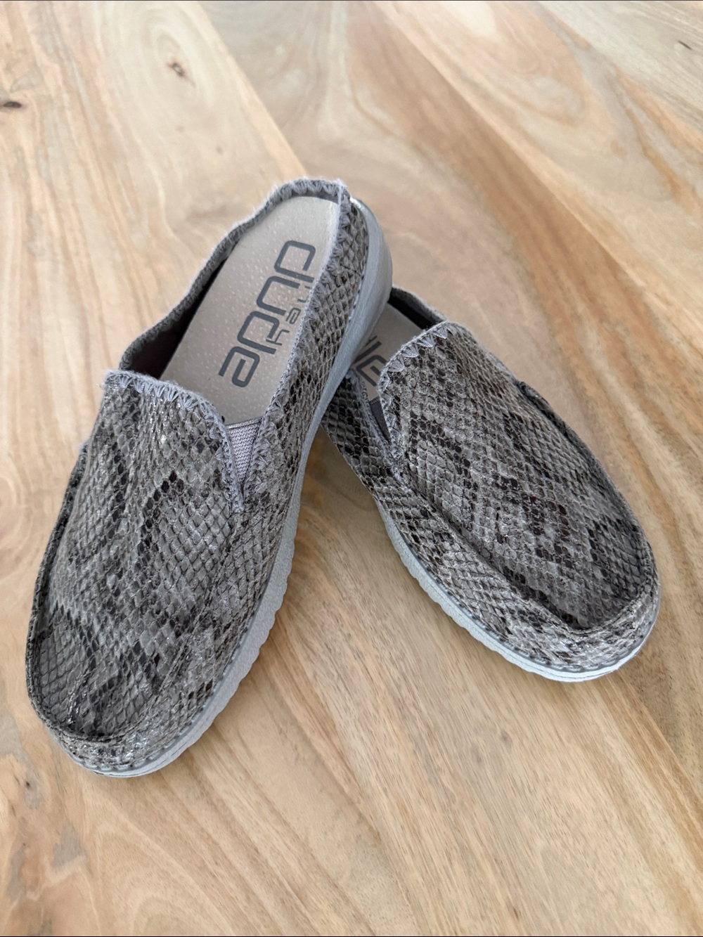 Hey Dude Women’s Slip-On Flats in Gray Snake Print